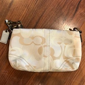Coach cream white wristlet
